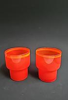 Retro orange ljuslyktor i glas